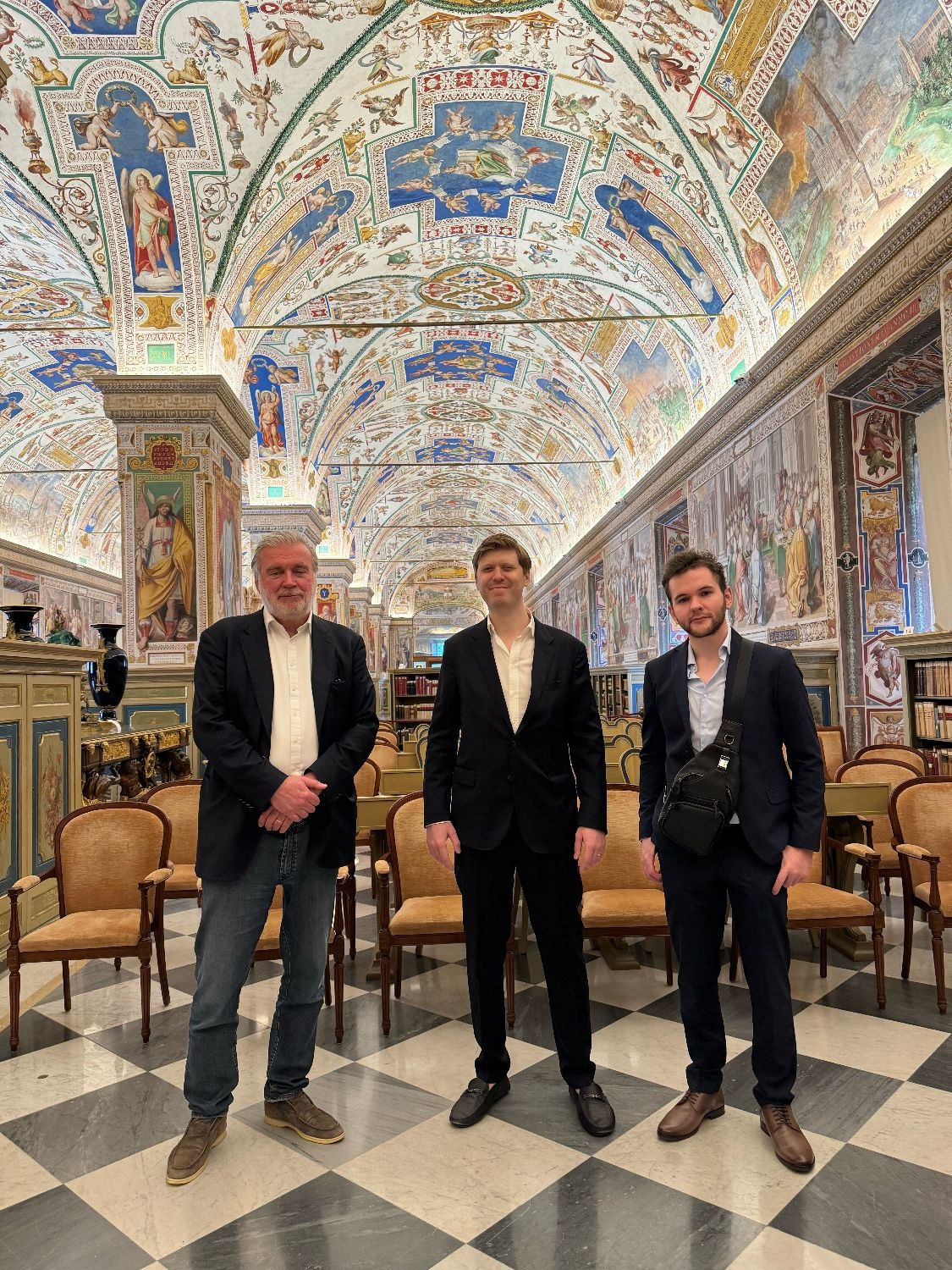 Three people during the Vatican tour